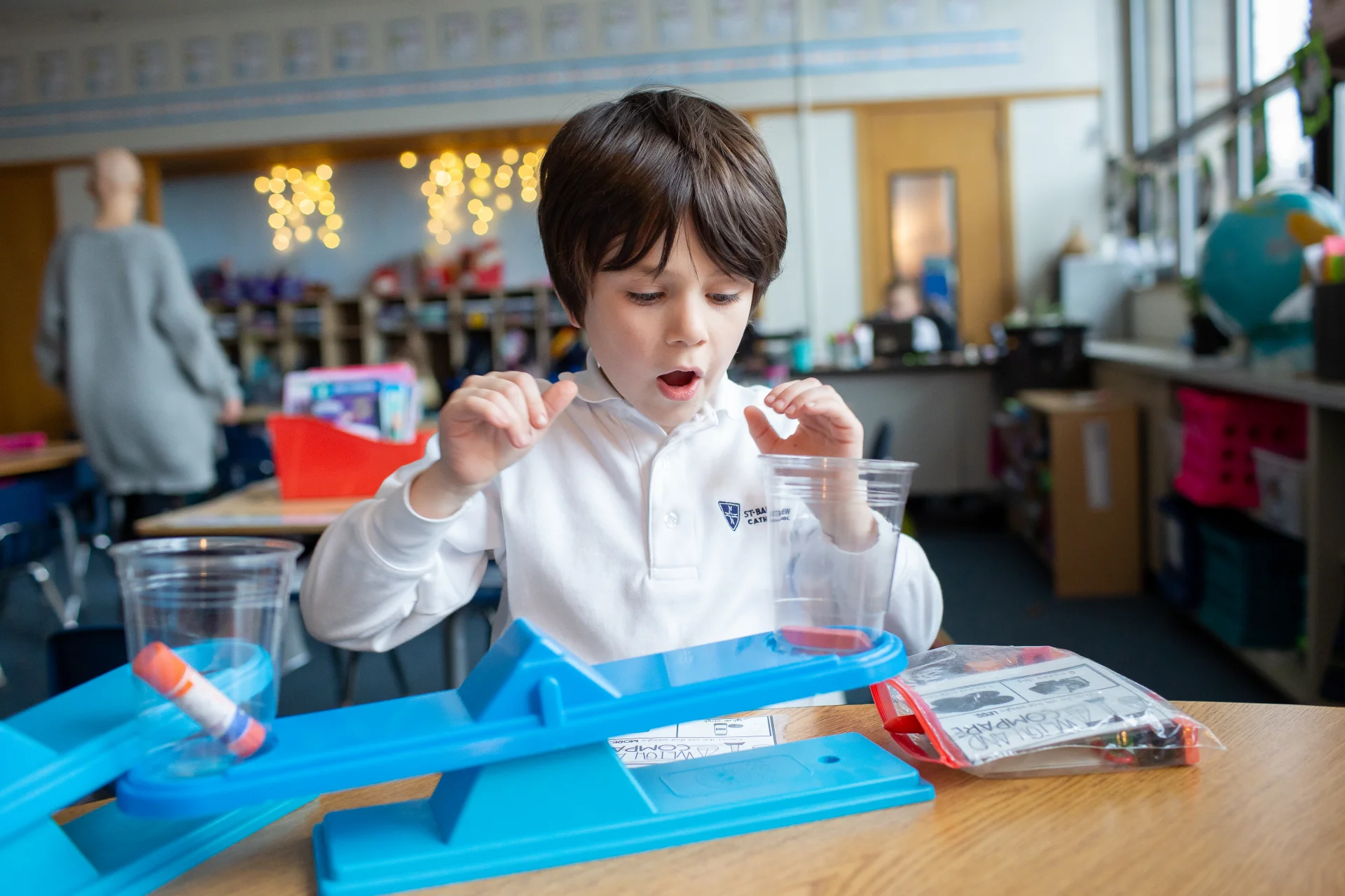 student excited over science project